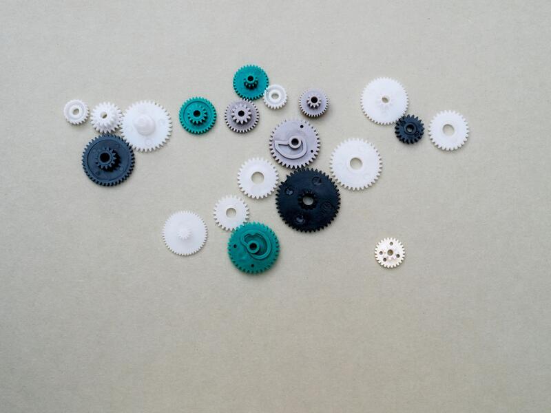 Engineered plastic components produced by industrial injection molding