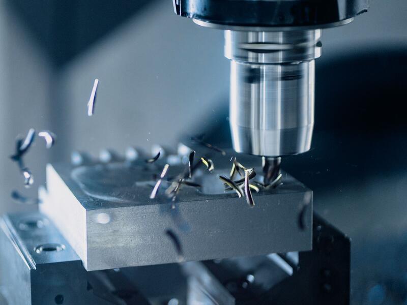 CNC machining equipment producing a precision metal component